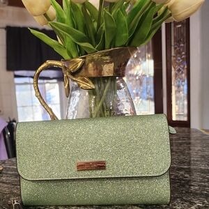 Kate Spade Mckenzie Medium Flap Seawater Wristlet/ Clutch. Measures 7.5×5. NWOT